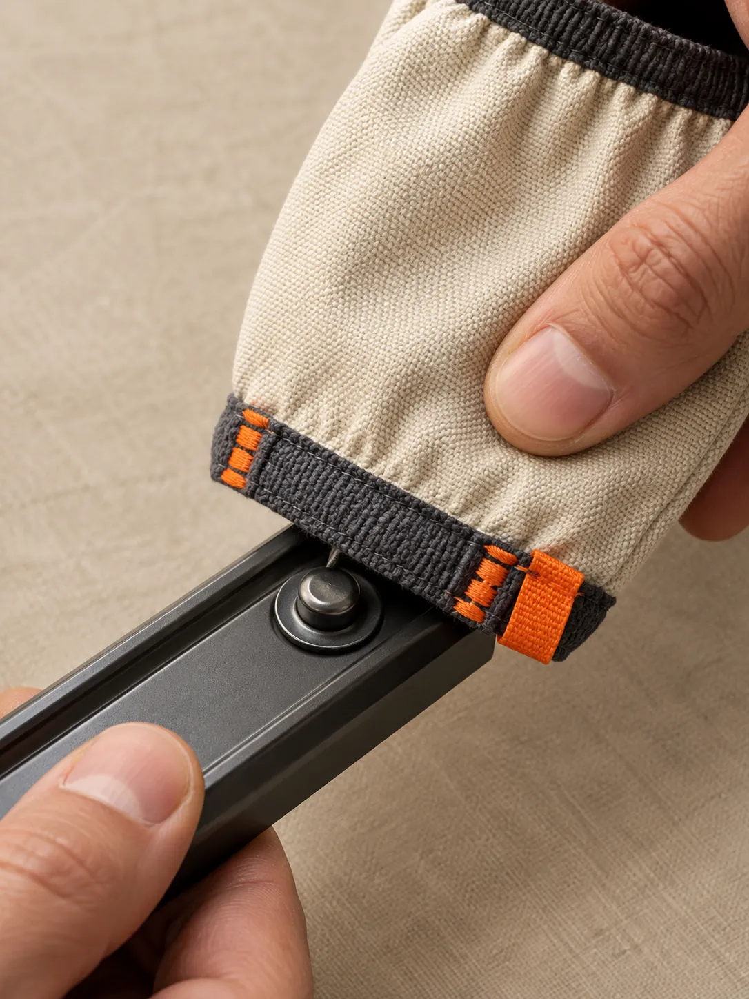 Canvas Sleeve Guards, 2 Pairs, close-up of the snap rail and pull tab