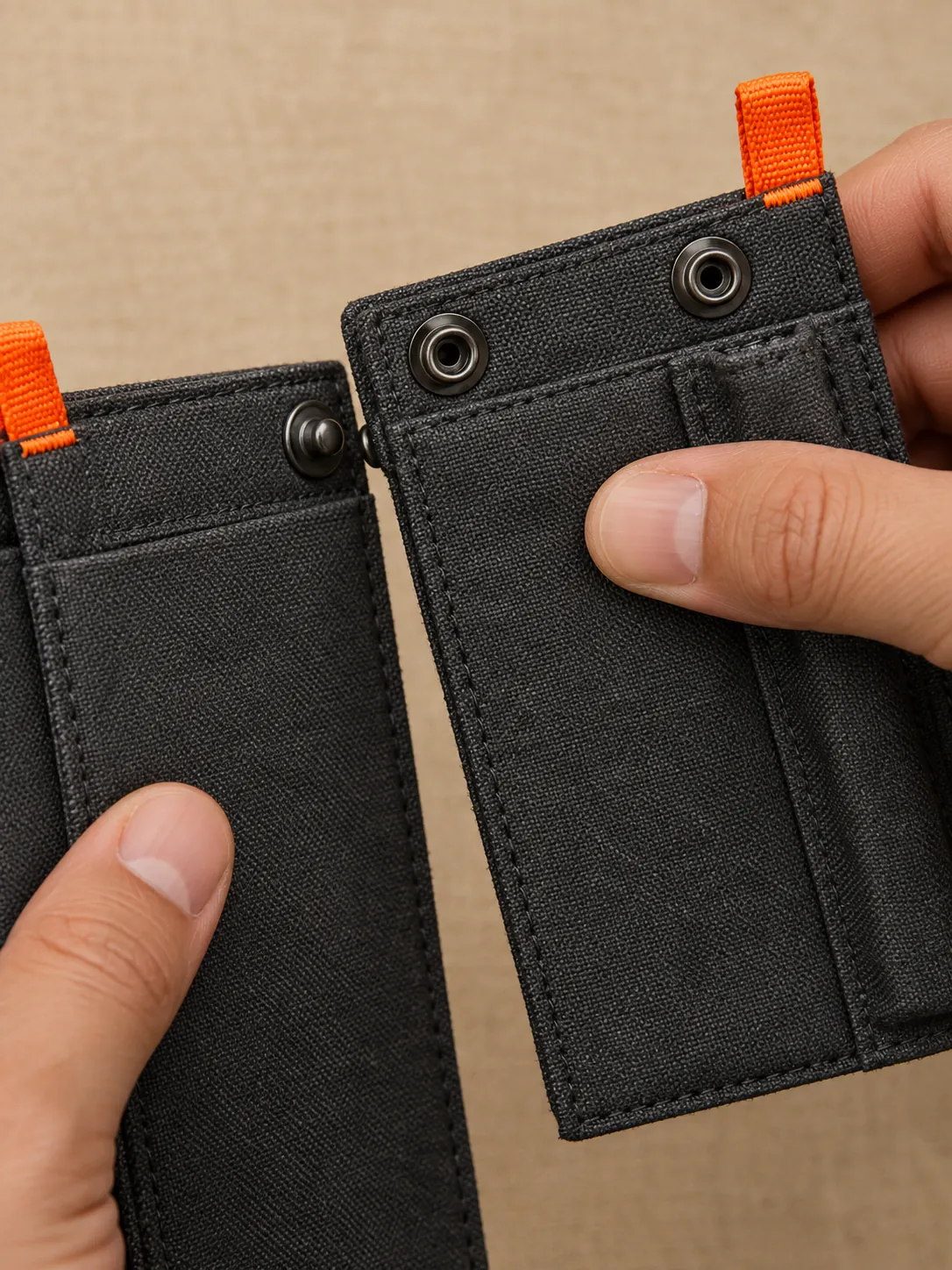 Notebook Pocket Pair, close-up of the snap rail and pull tab