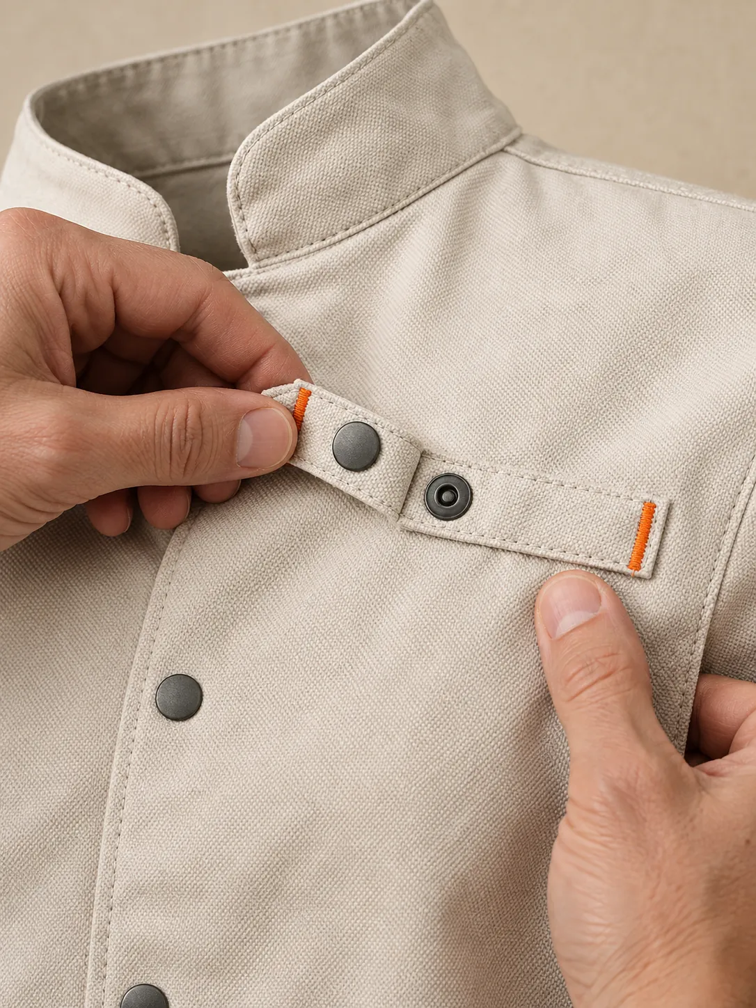 Pastry Snap Jacket, close-up of the snap rail and pull tab
